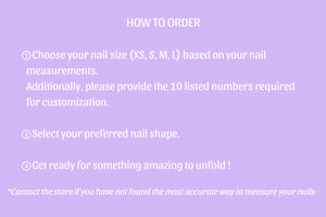 Summer floral press on nails with orange flower nail art, coral details, rhinestones, and glossy square nail design