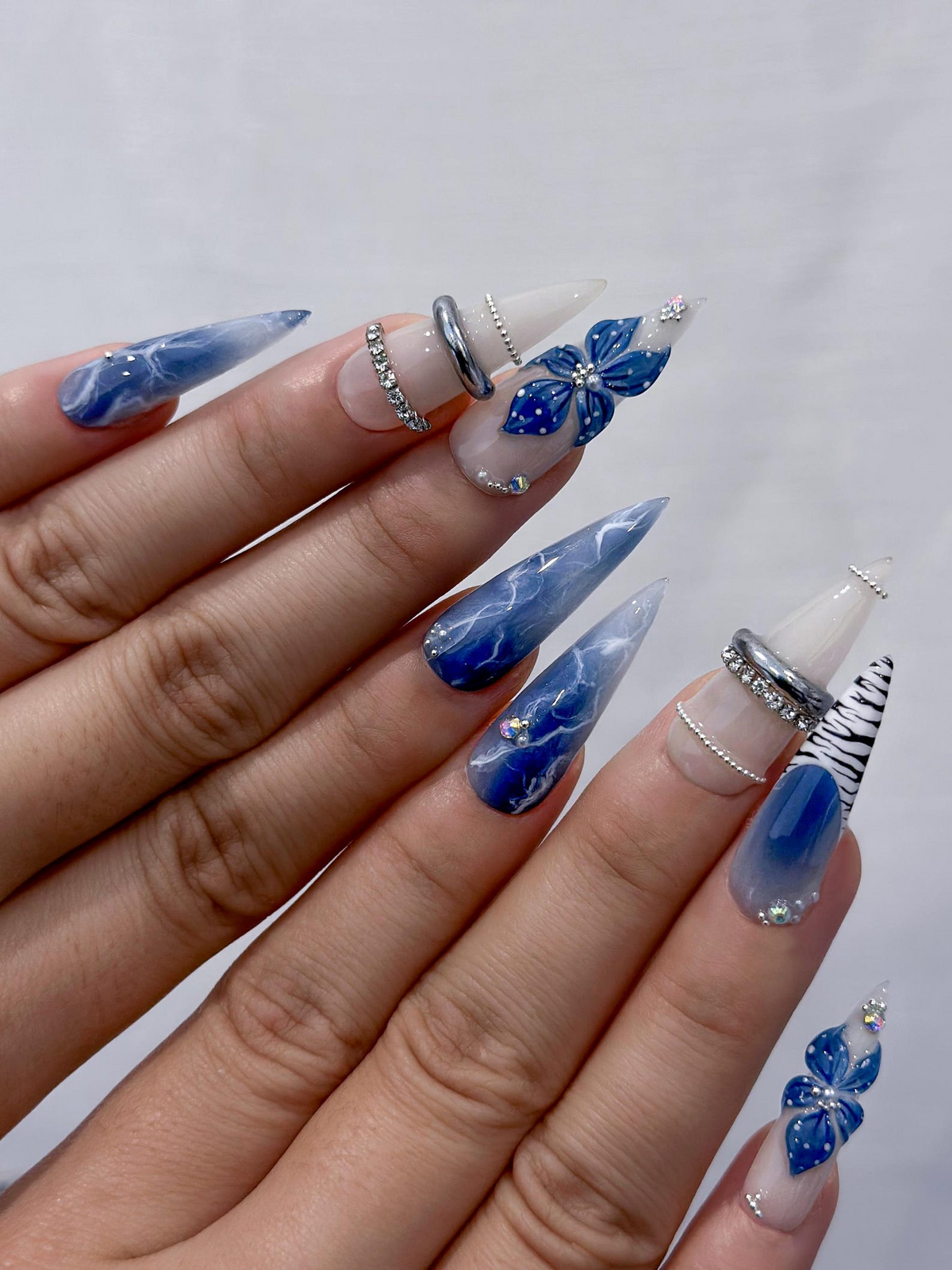 Blue Marble Blossom Press On Nails for Spring Blue | Handmade Nude & Sapphire Nails with Floral Art | Elegant Stiletto Nail Design |OB2890EC