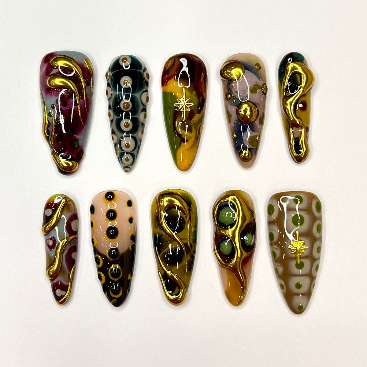 3D press on nails with textured gold swirls and earthy tones of green, brown, and amber — long fake nails, handmade artistic nail art, reusable press ons, perfect for fall outfits or bold aesthetic lo