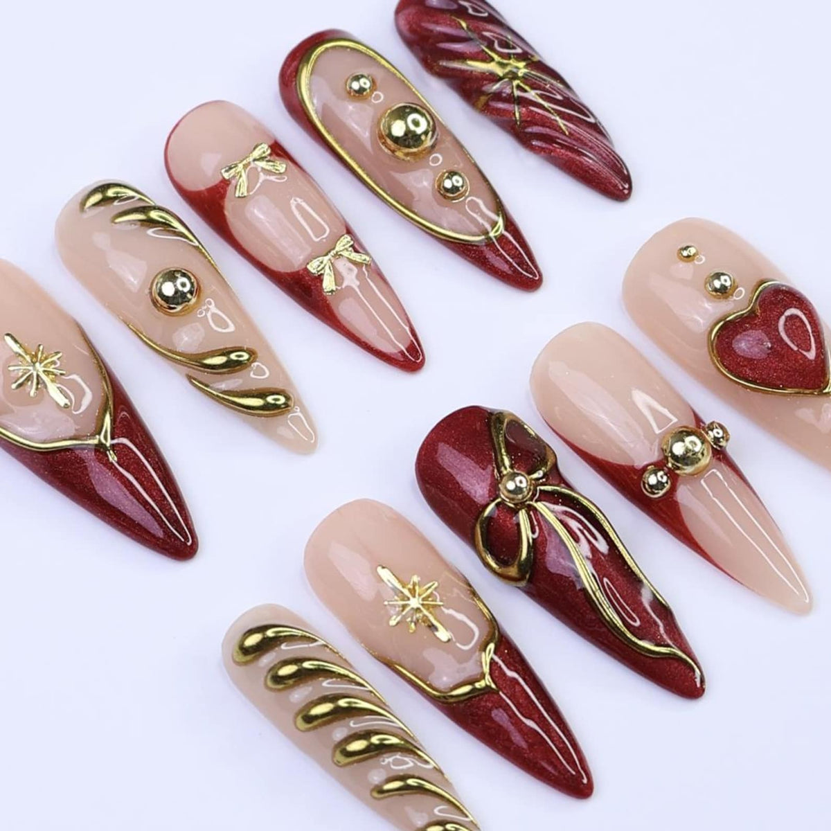 Christmas Red Press-On Nails with Gold Ribbon & Heart Designs | Long Stiletto Fake Nails | Handmade Holiday Luxury Nail Art