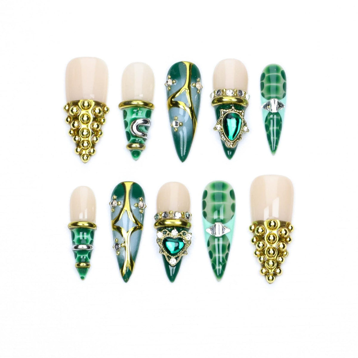 A set of ten press-on nails featuring a variety of designs in shades of green, cream, and gold. The nails include pointed and rounded shapes adorned with metallic gold studs, green gemstone accents, intricate gold filigree, and patterns.