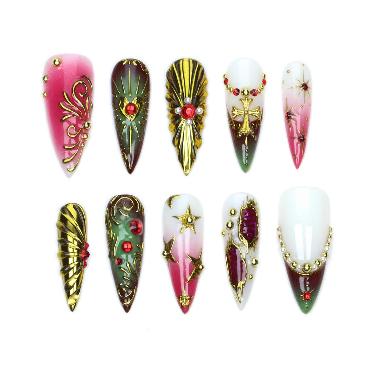 A set of ten stiletto-shaped press-on nails featuring intricate designs in red, white, green, and gold. The nails are decorated with metallic gold filigree, raised gold crosses, star motifs, small pearls, and embedded red rhinestones.