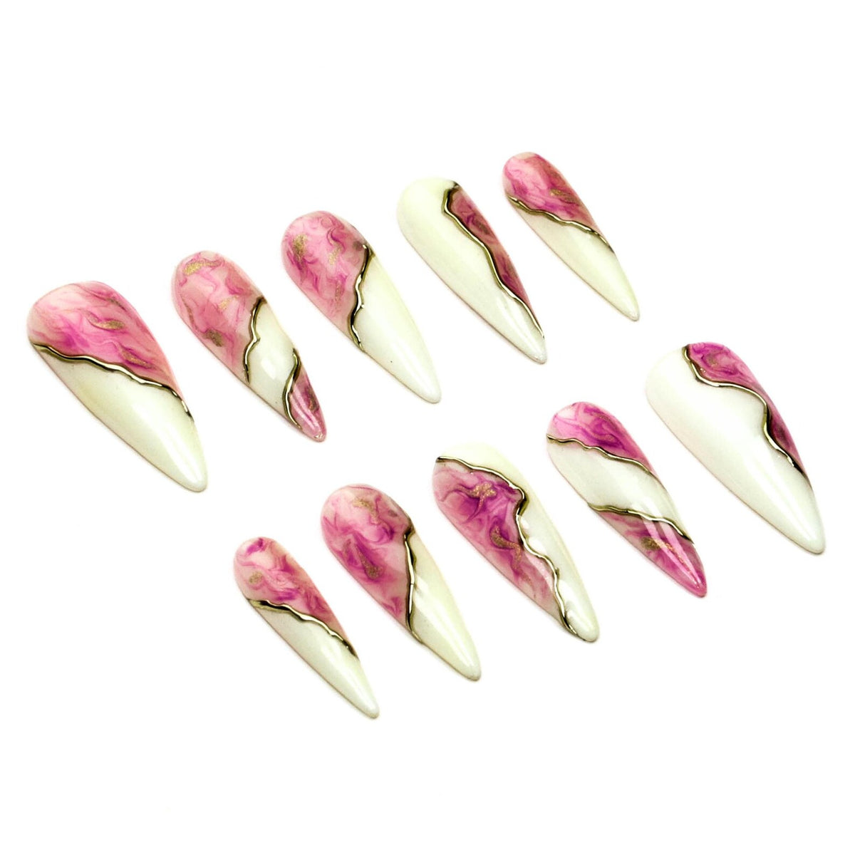 A set of ten stiletto-shaped press-on nails featuring a split design. Each nail has a creamy off-white base on one side and a vibrant pink marbled pattern on the other, separated by a thin, wavy metallic gold line running diagonally.