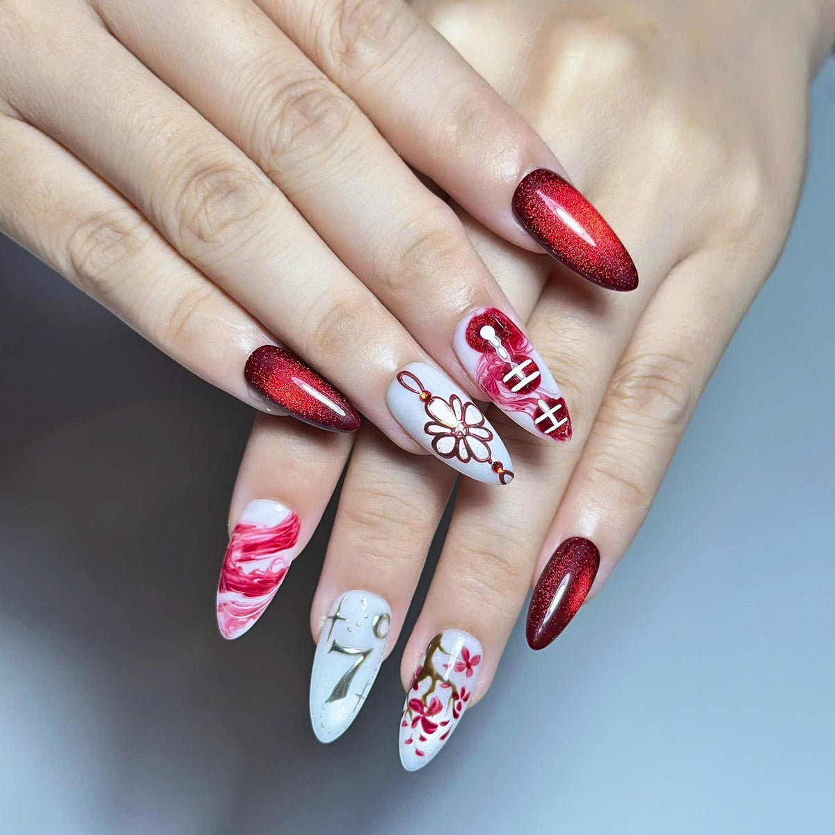 Handmade K-pop concert inspired press on nails featuring burgundy chrome gradients, glossy marble nail art, elegant floral details, concertcore aesthetic, and luxury reusable gel nails perfect for concerts, fan meetings, and music festivals.