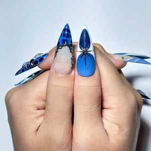 Handmade blue ocean press on nails featuring jellyfish-inspired 3D nail art, starfish accents, ocean marble effects, blue aura gradients, chrome detailing, mermaid aesthetic, and luxury reusable gel nails.