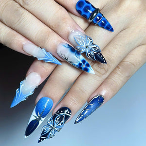 Handmade blue ocean press on nails featuring jellyfish-inspired 3D nail art, starfish accents, ocean marble effects, blue aura gradients, chrome detailing, mermaid aesthetic, and luxury reusable gel nails.