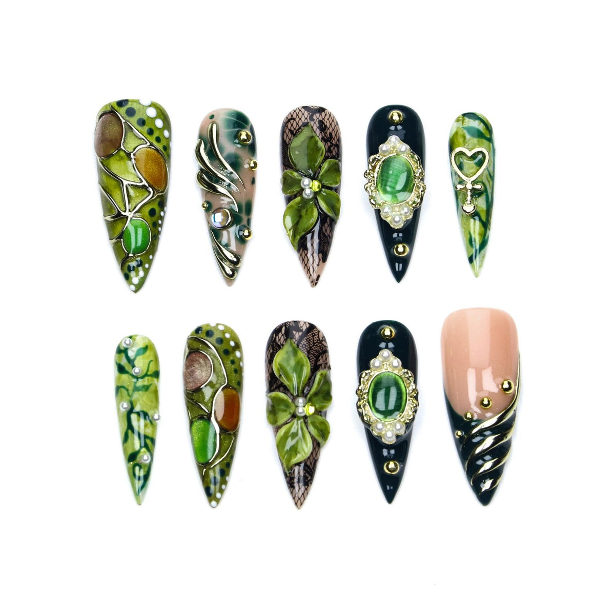 A set of ten stiletto-shaped press-on nails featuring diverse green, black, and nude designs. Embellishments include 3D floral motifs, gold metallic accents, intricate lace patterns, faux gemstones, and small pearls on various nail surfaces.