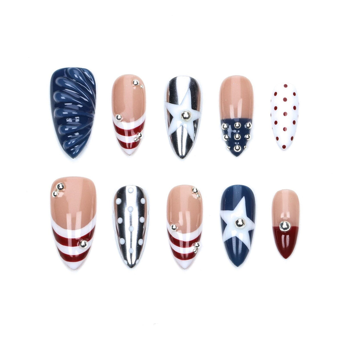 A set of ten almond-shaped press-on nails featuring a patriotic theme. Designs include navy blue textured swirls, red and white stripes, white stars on navy blue, silver metallic finishes with polka dots, and red polka dots on white.
