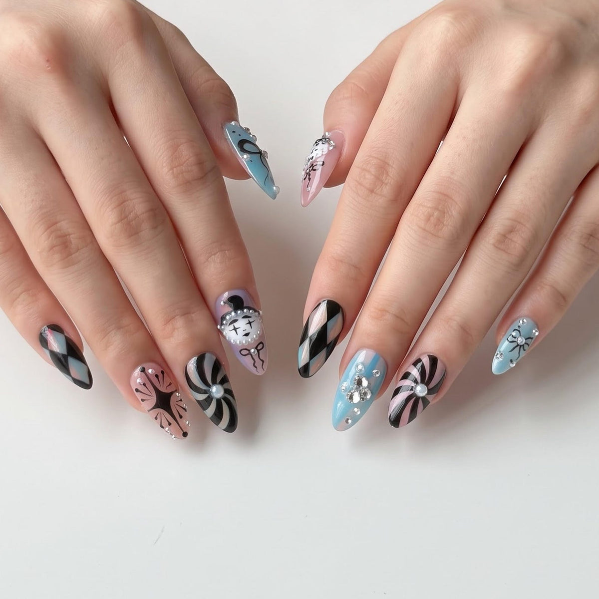 Handmade clown press on nails with vintage clock design, pastel pink and turquoise colors, Harlequin diamond pattern, gothic circus aesthetic, long almond fake nails featuring rhinestones, bows, and whimsical clowncore nail art perfect for cosplay, H