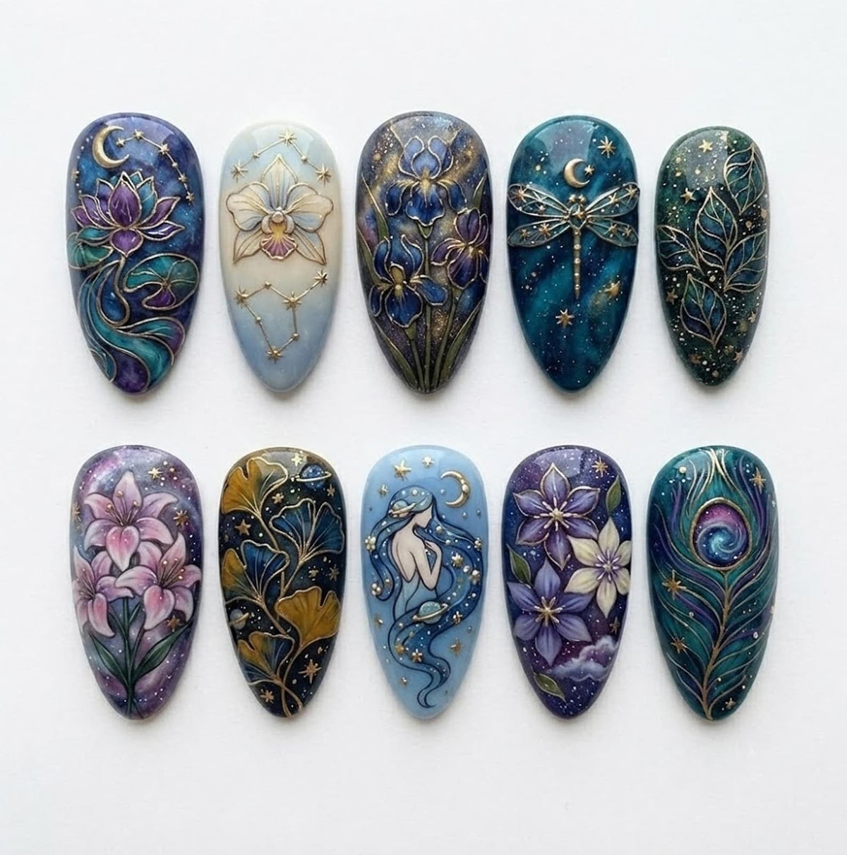 A set of ten almond-shaped press-on nails featuring intricate hand-painted designs including a lotus, orchid, iris, dragonfly, leaves, lilies, ginkgo leaves, a celestial figure, purple flowers, and a peacock feather with gold accents.