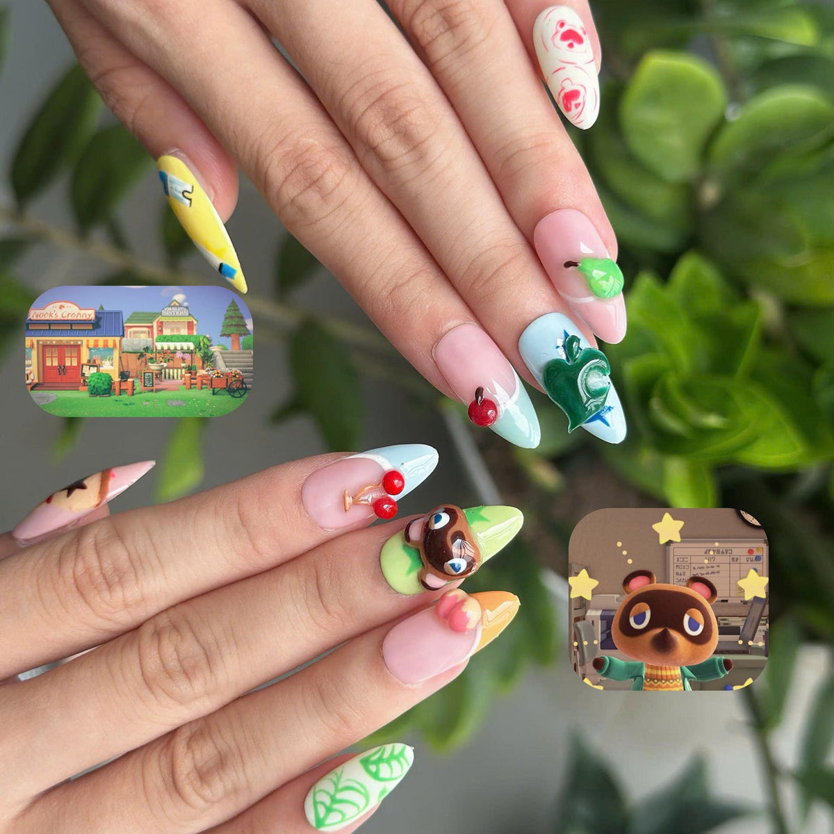 Cozy game inspired press on nails with cute animal, fruit and leaf details in pastel pink, green, blue and yellow on glossy almond shaped nails
