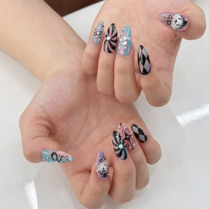 Handmade clown press on nails with vintage clock design, pastel pink and turquoise colors, Harlequin diamond pattern, gothic circus aesthetic, long almond fake nails featuring rhinestones, bows, and whimsical clowncore nail art perfect for cosplay, H