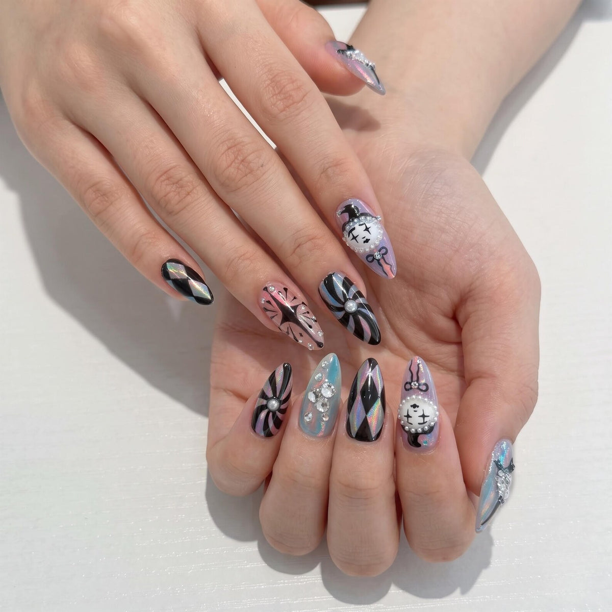 Handmade clown press on nails with vintage clock design, pastel pink and turquoise colors, Harlequin diamond pattern, gothic circus aesthetic, long almond fake nails featuring rhinestones, bows, and whimsical clowncore nail art perfect for cosplay, H
