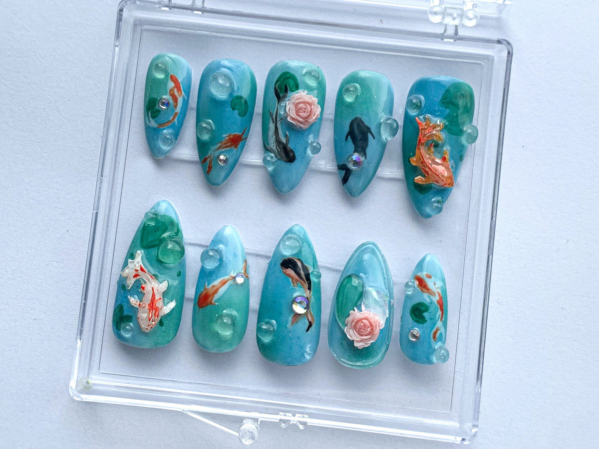 Ocean-Inspired Press On Nails | Hand Painted Koi Fish Nail Art | Blue with Underwater Flowers charms On Fake Nails | Ocean Nails | OB385T