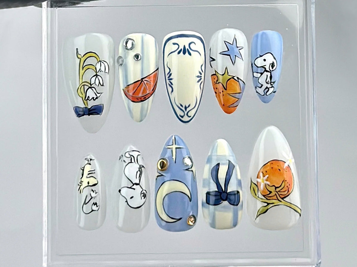 Snoopy Inspired Press On Nails | Artistic Snoopy and Moon Nail Art | Cartoon-Themed Fake Nails | Fun Cartoon Nail Polish | Cute Nails|OB676Y
